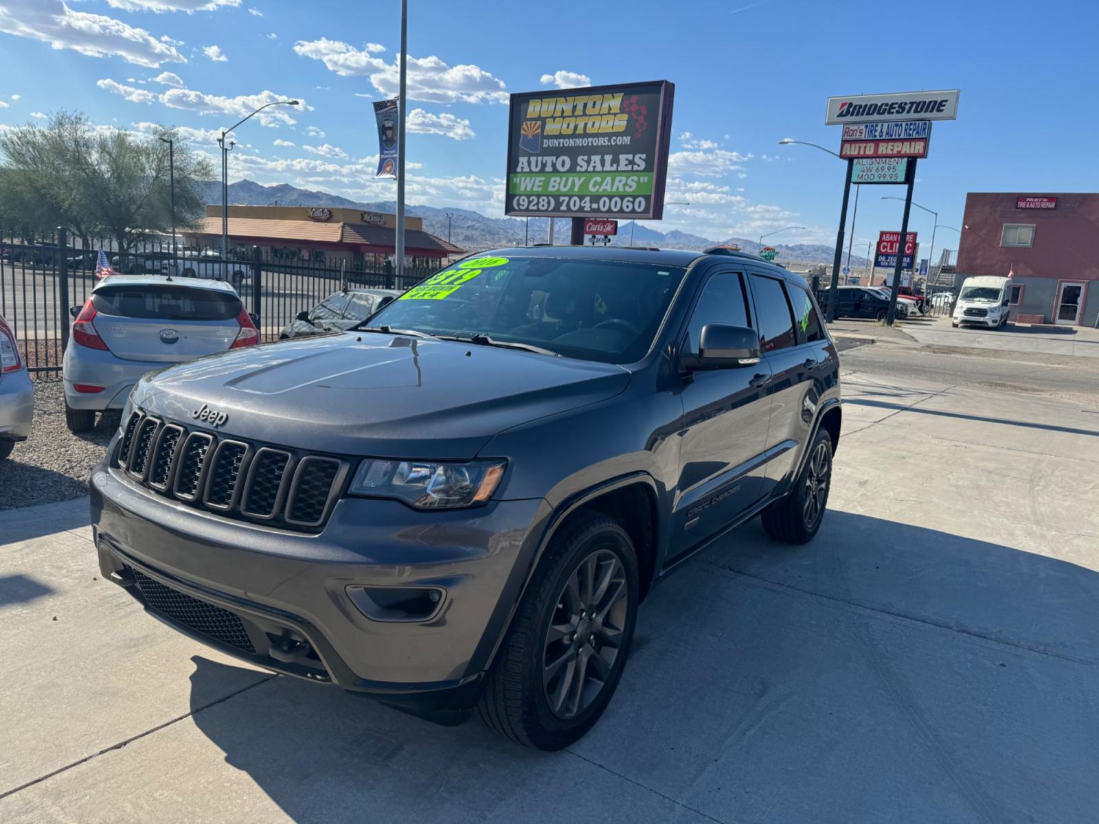 2016 grey Jeep Grand Cherokee (1C4RJFBG0GC) , located at 2190 Hwy 95, Bullhead City, AZ, 86442, (928) 704-0060, 0.000000, 0.000000 - 75th anniversary edition. clean carfax. jeep grand cherokee limited 4 wd. Leather loaded. 81k miles. free and clear title. - Photo #23